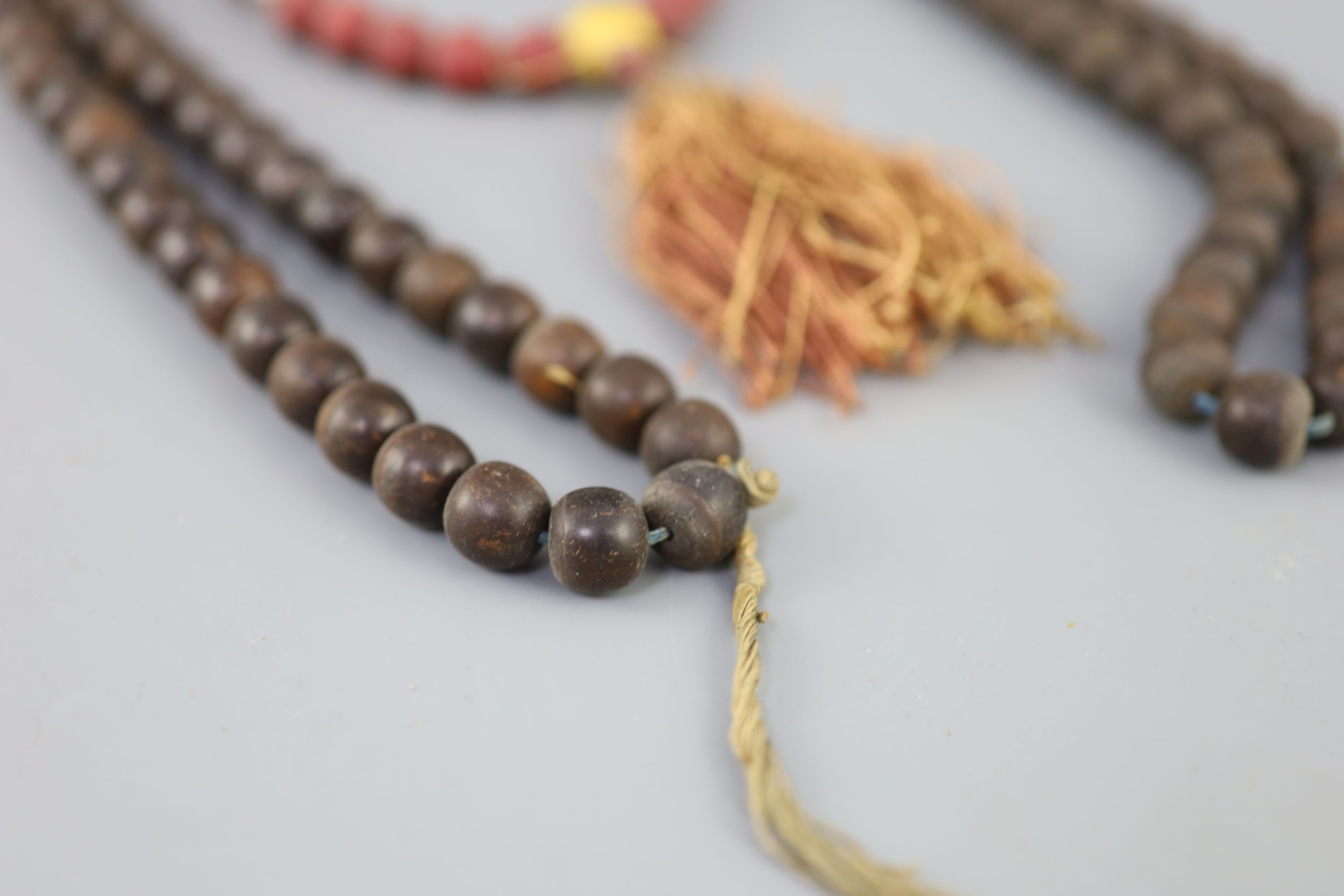 A Sino-Tibetan Buddhist seed bead rosary, 19th century and a Chinese composition bead rosary, early 20th century Provenance - A. T. Arb